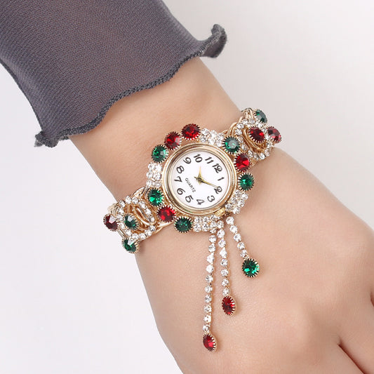 Montre-bracelet pour femmes avec strass et pampille