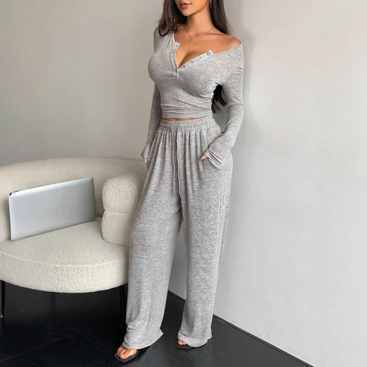Pantalon pour femmes à manches longues avec boutons et col en V
