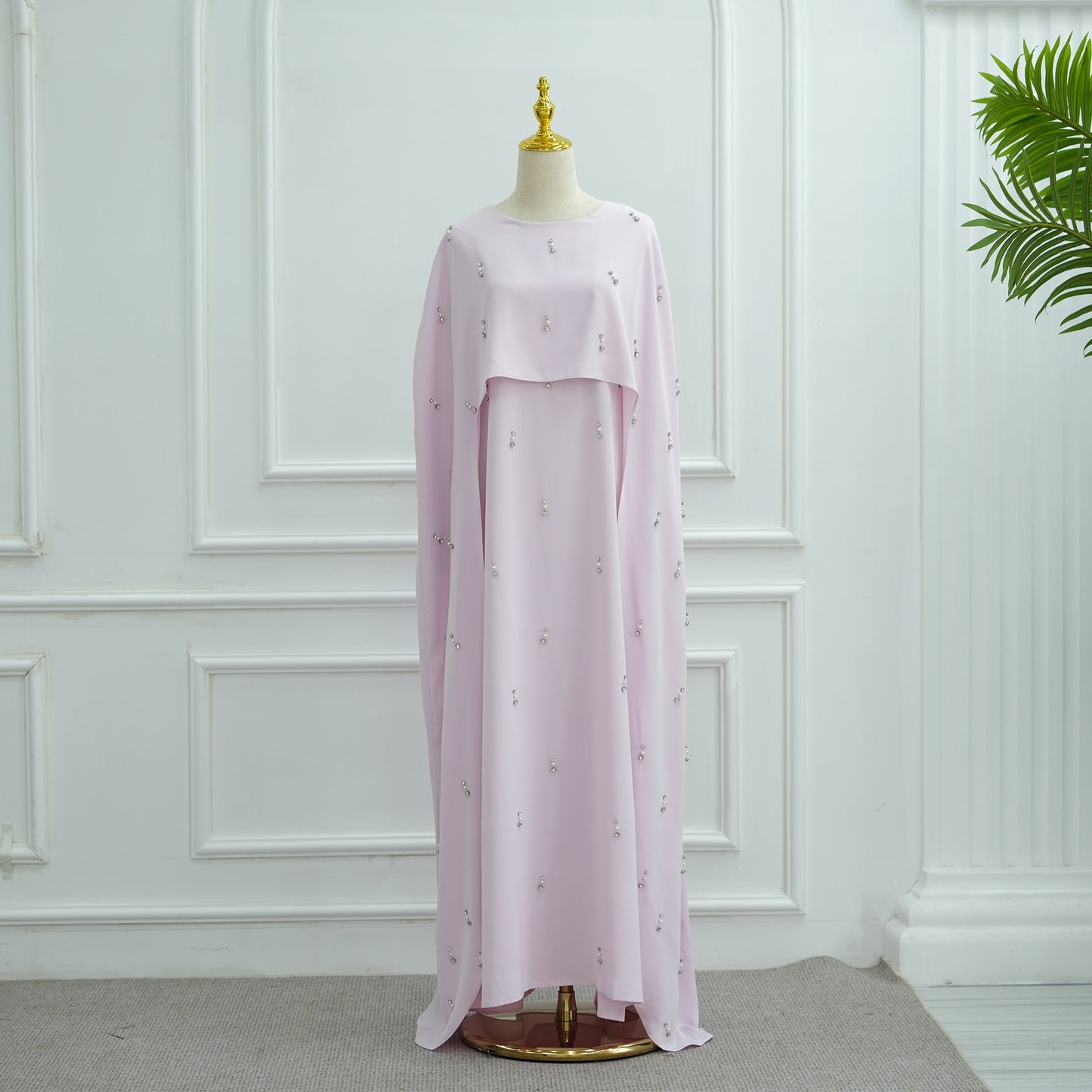 Robe élégante en deux pièces avec jupe évasée et perles