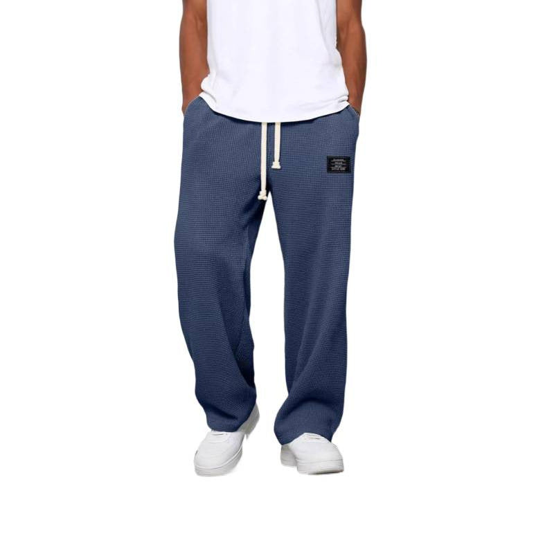 Pantalon décontracté à cordon de serrage en tissu gaufré pour homme