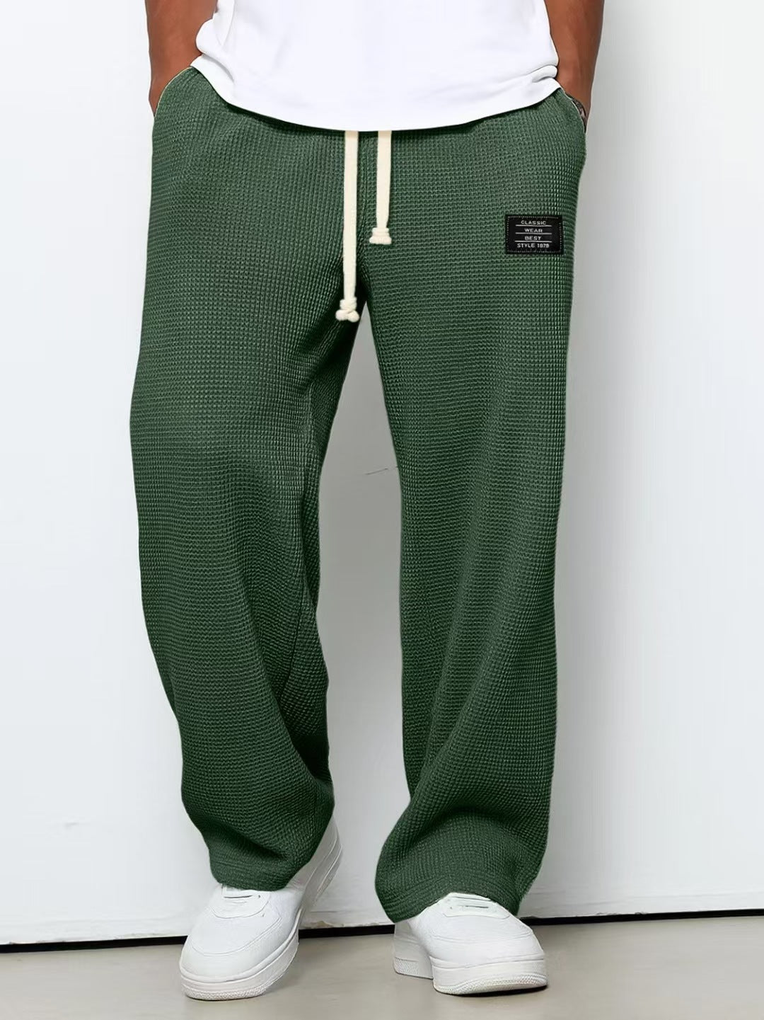 Pantalon décontracté à cordon de serrage en tissu gaufré pour homme
