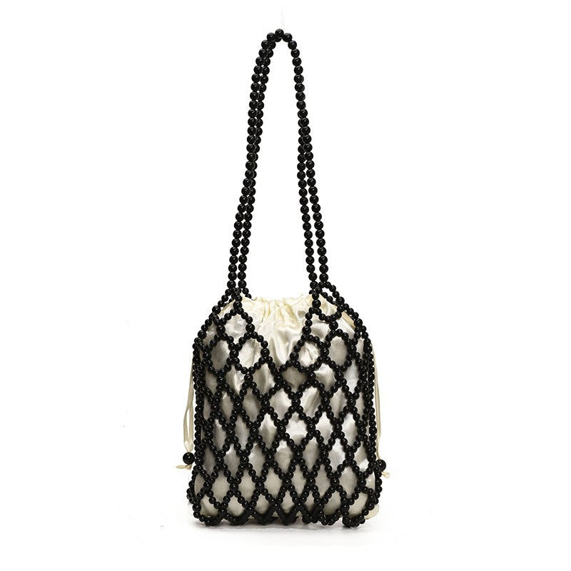 Sac à bandoulière tissé et perlé