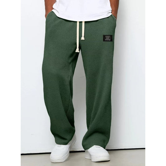 Pantalon décontracté à cordon de serrage en tissu gaufré pour homme