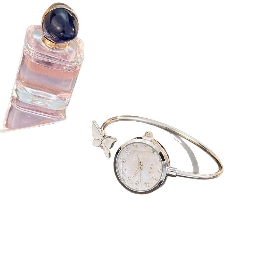 Montre en quartz à bracelet ouvert avec incrustation de diamants