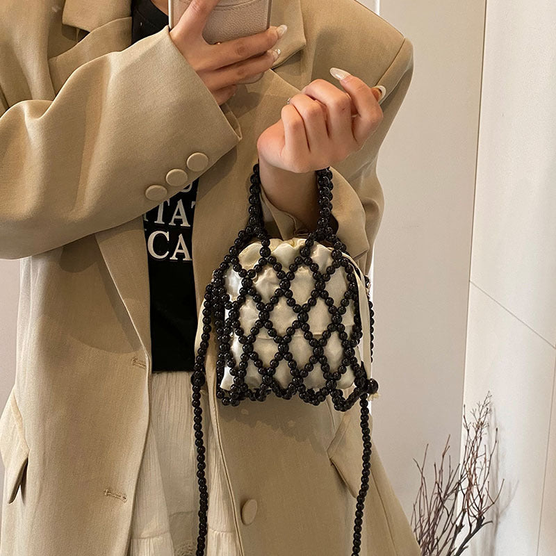 Sac à bandoulière tissé et perlé