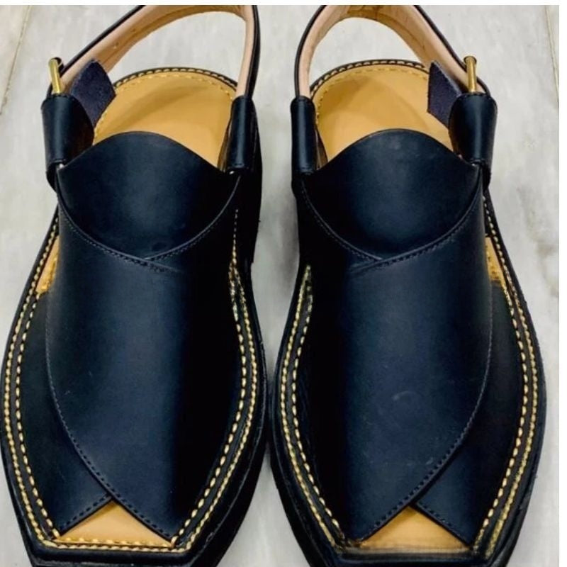 Sandales plates en cuir tressé
