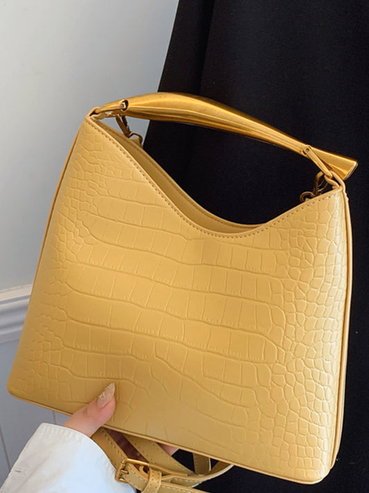 Sac seau à motif crocodile texturé