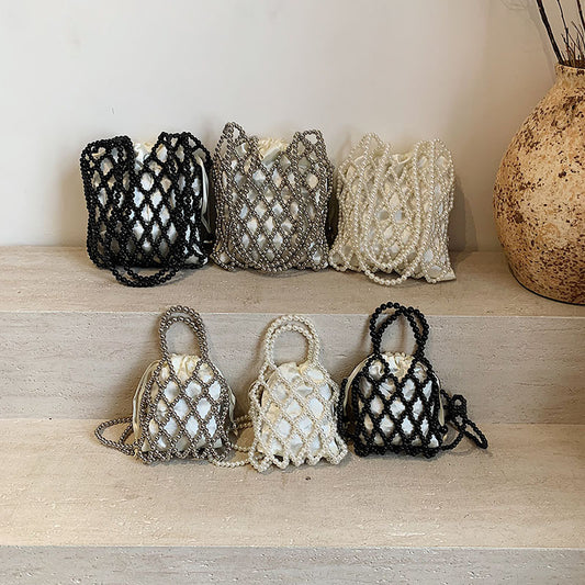 Sac à bandoulière tissé et perlé