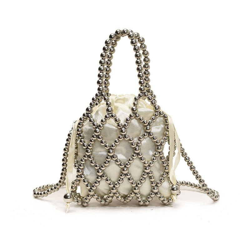 Sac à bandoulière tissé et perlé