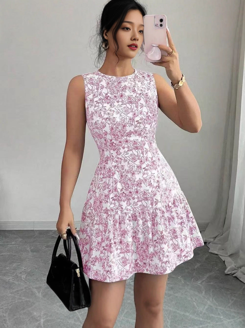 Robe à jupe en couche sans manches à imprimé floral