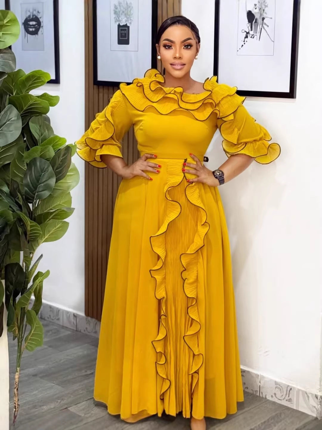 Habit :Robe élégante en mousseline à volants et taille cintrée