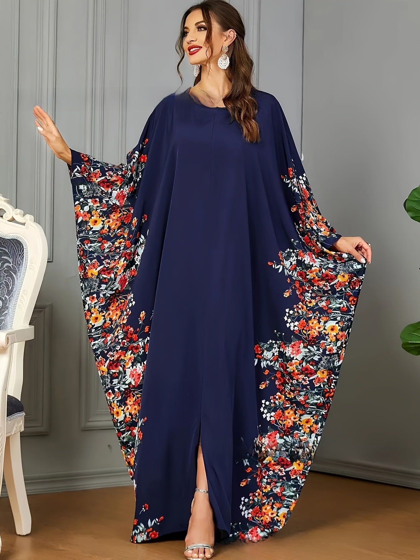 Robe longue élégante à manches chauve-souris
