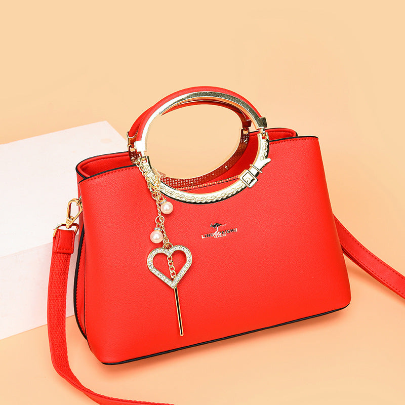 Sac seau tendance avec bandoulière ajustable
