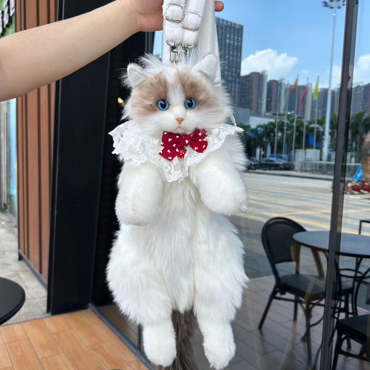 Sac à dos poupée chat en peluche