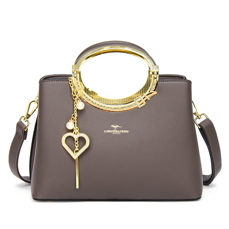 Sac seau tendance avec bandoulière ajustable