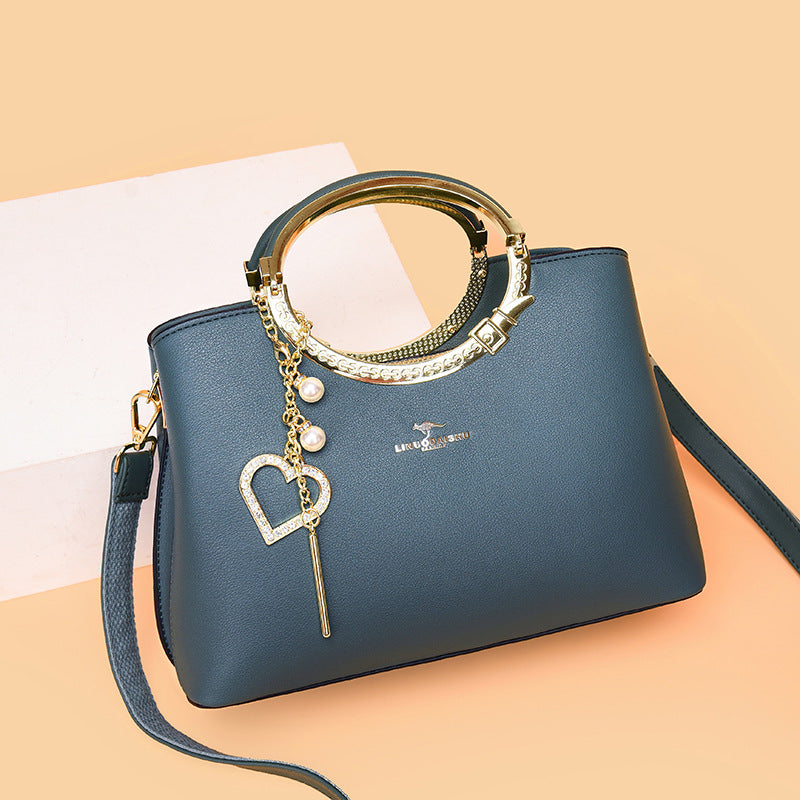 Sac seau tendance avec bandoulière ajustable