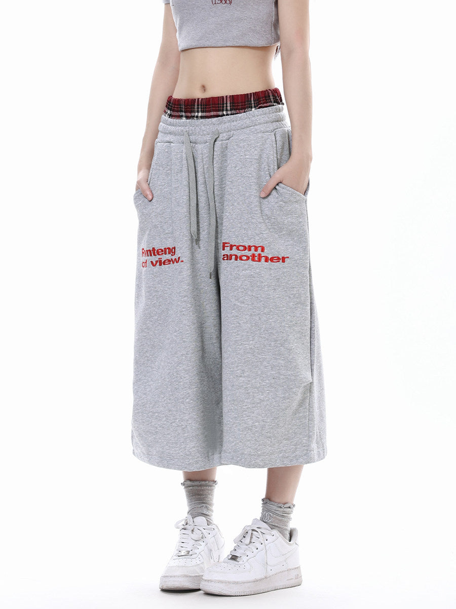 Pantalon court décontracté à carreaux patchwork et double taille
