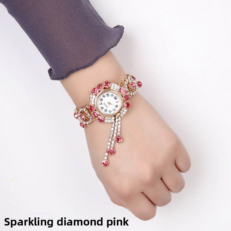 Montre-bracelet pour femmes avec strass et pampille