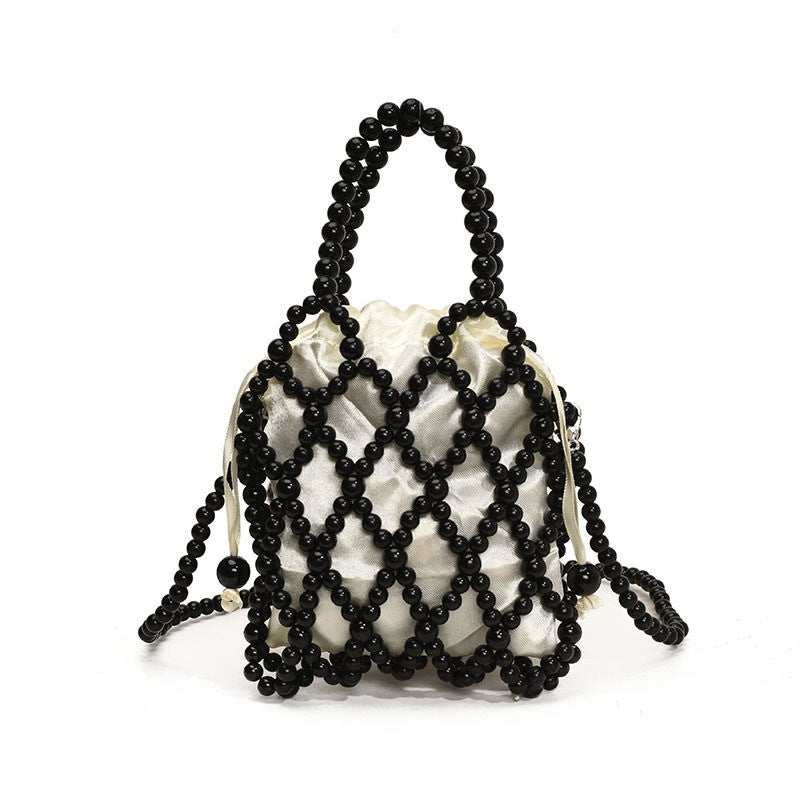 Sac à bandoulière tissé et perlé