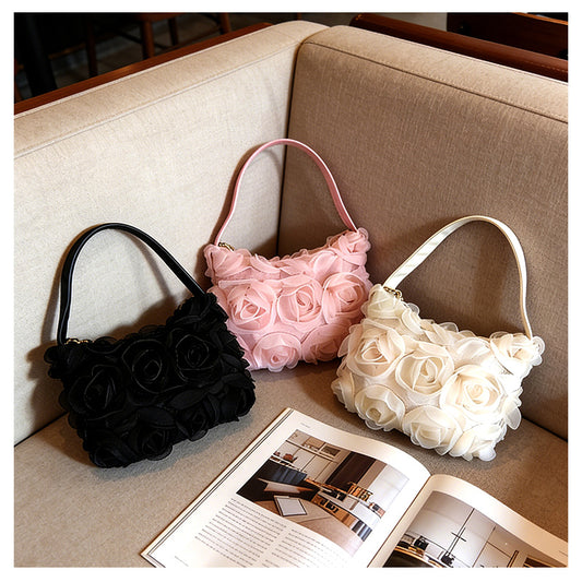 Sac bandoulière de soirée en dentelle rose