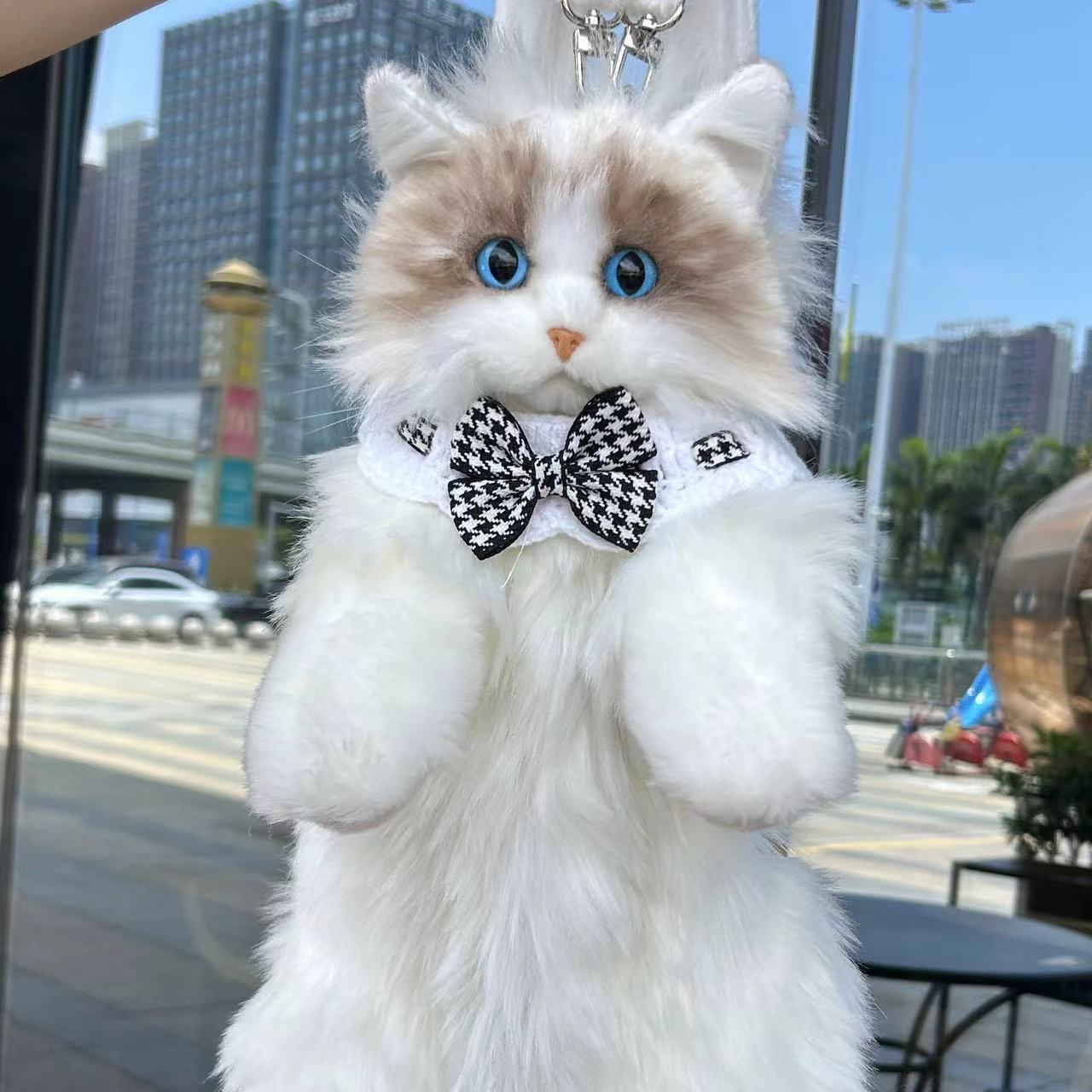 Sac à dos poupée chat en peluche