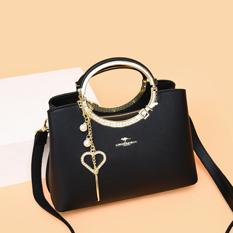 Sac seau tendance avec bandoulière ajustable