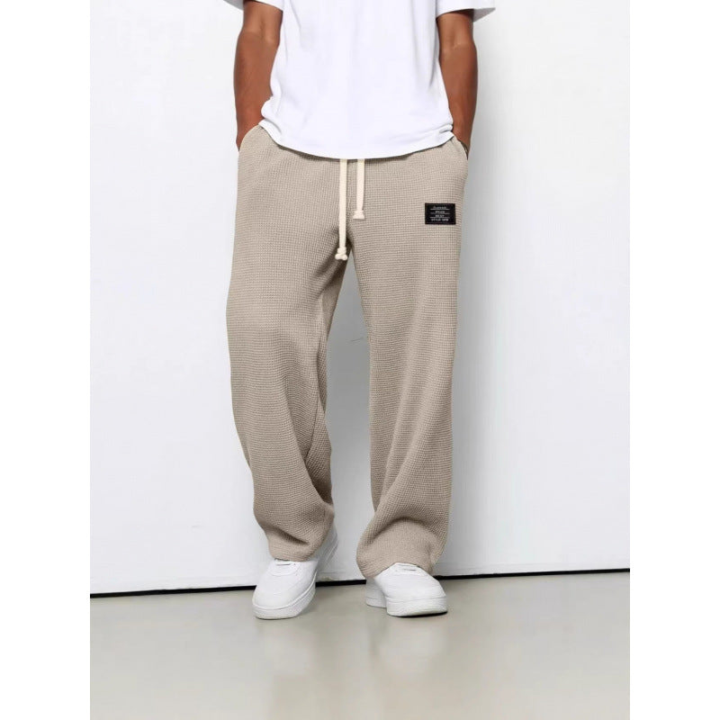 Pantalon décontracté à cordon de serrage en tissu gaufré pour homme