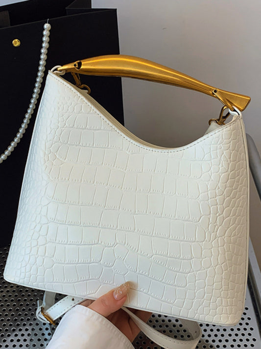 Sac seau à motif crocodile texturé
