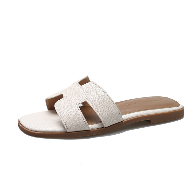 Sandales plates en forme de H pour la plage