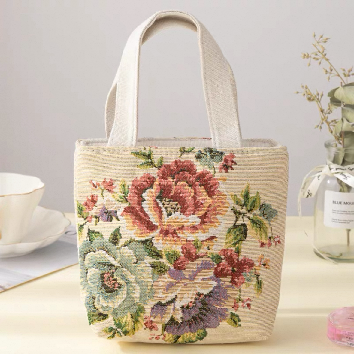 Sac à main en toile brodée double face
