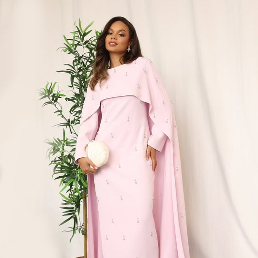Robe élégante en deux pièces avec jupe évasée et perles