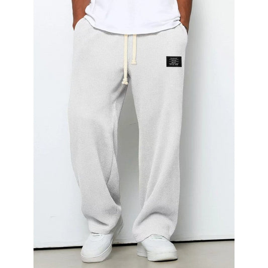 Pantalon décontracté à cordon de serrage en tissu gaufré pour homme