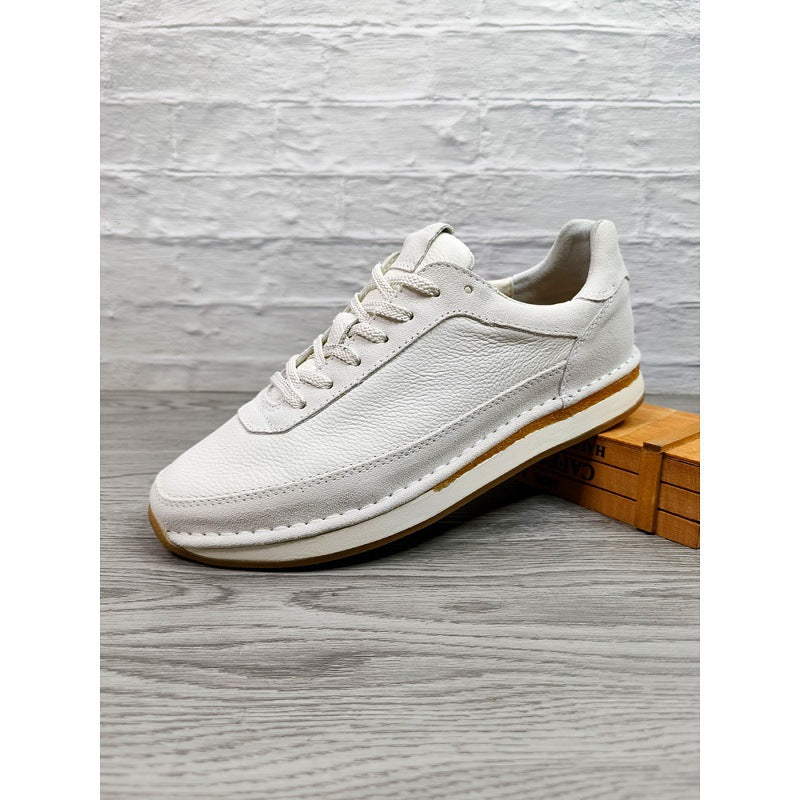 Chaussures décontractées pour hommes en cuir véritable, respirantes et confortables, à semelle plate.
