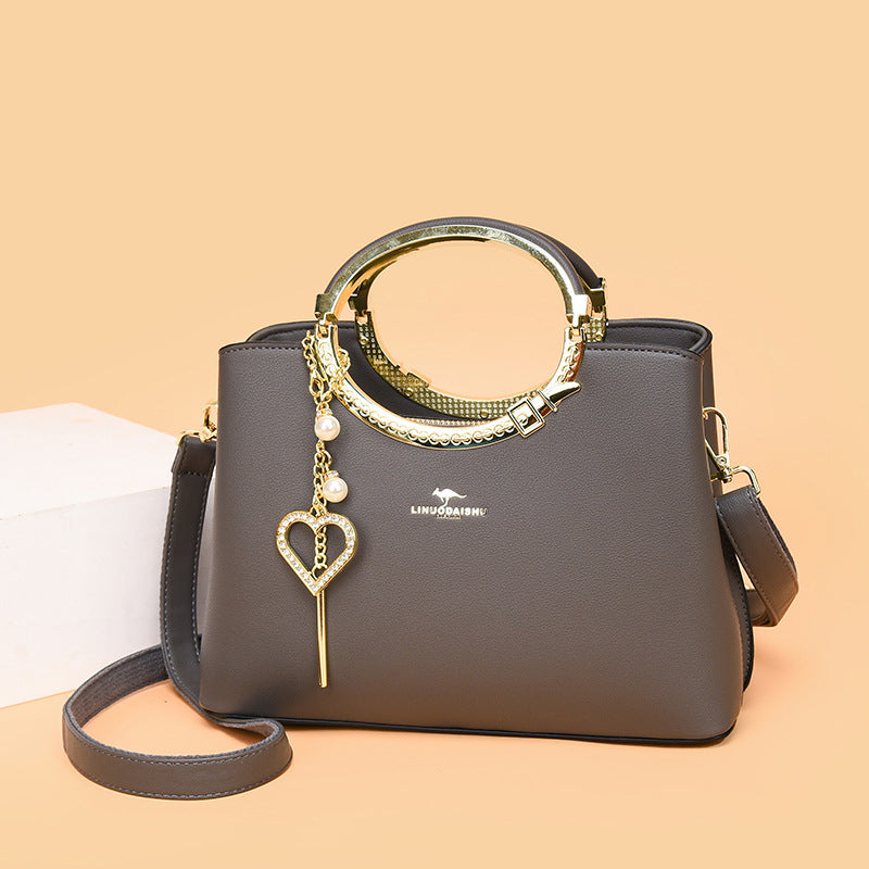 Sac seau tendance avec bandoulière ajustable