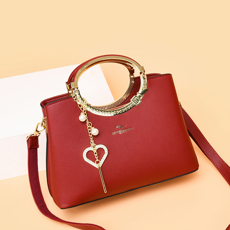Sac seau tendance avec bandoulière ajustable