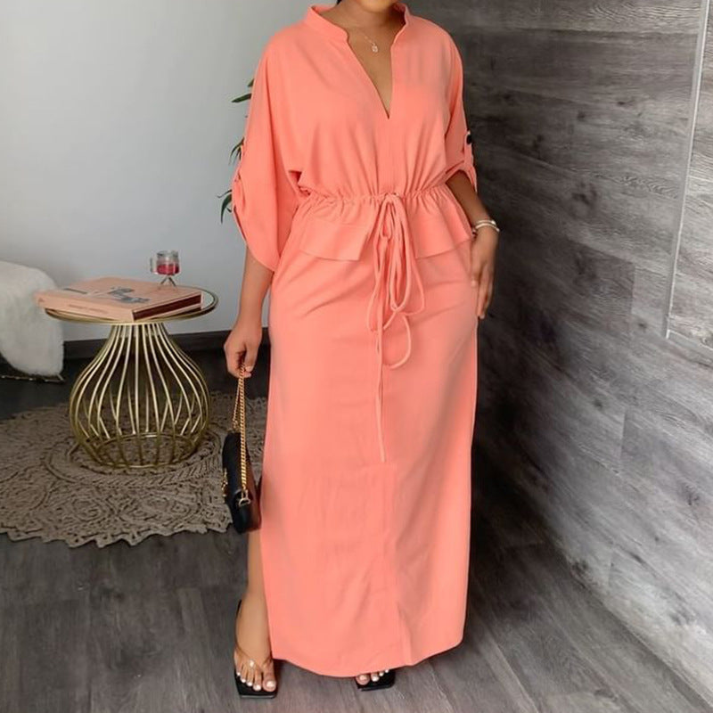 Robe longue élégante avec liens et manches chauve-souris