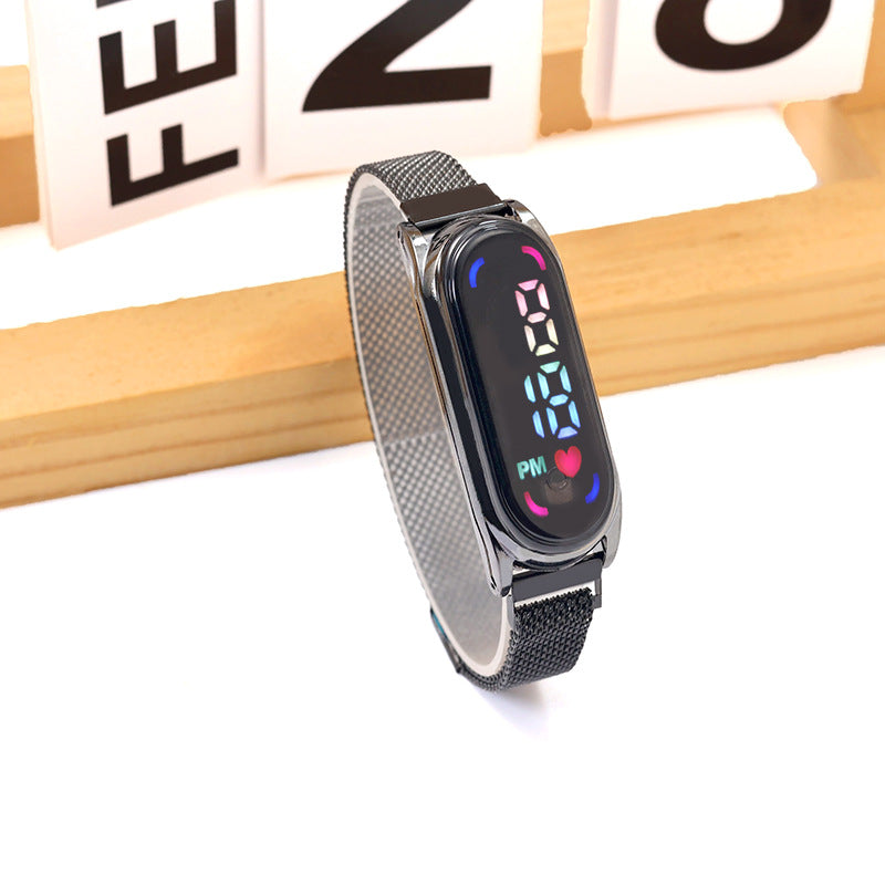 Montre électronique à LED avec lumières colorées et bracelet magnétique