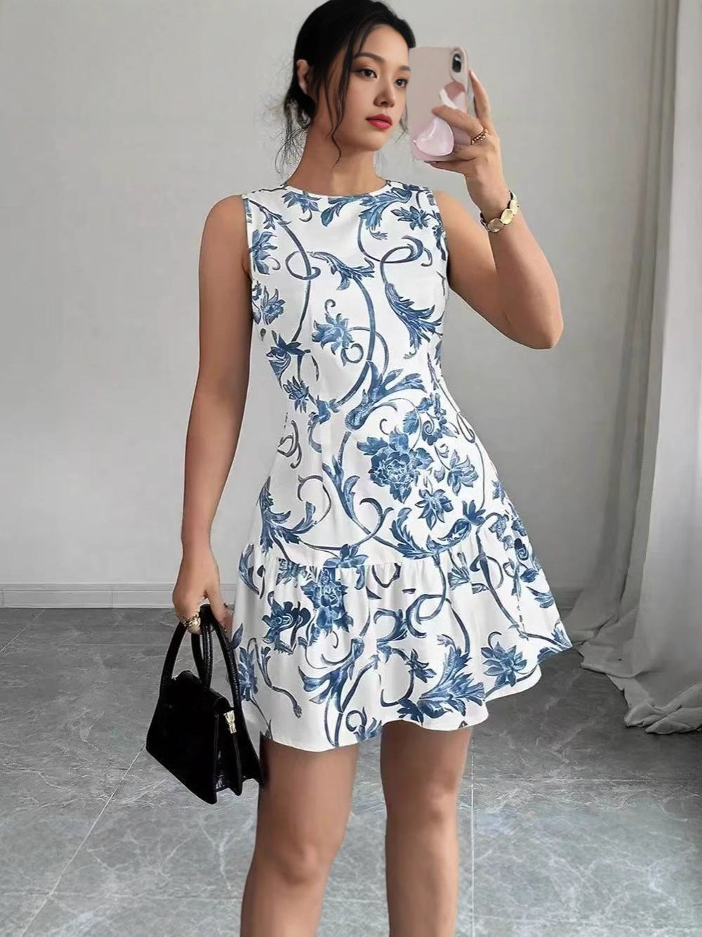 Robe à jupe en couche sans manches à imprimé floral