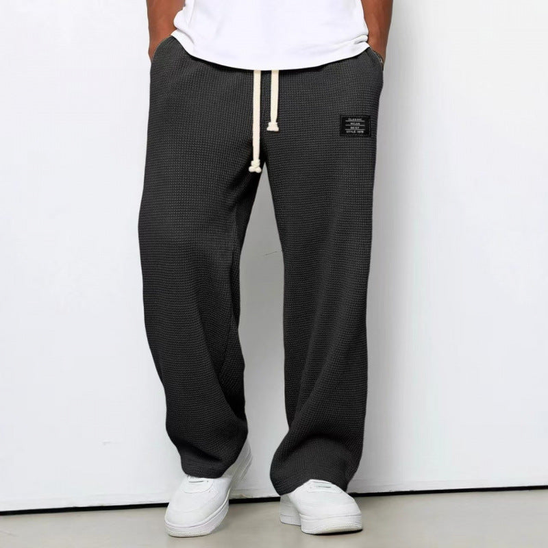 Pantalon décontracté à cordon de serrage en tissu gaufré pour homme