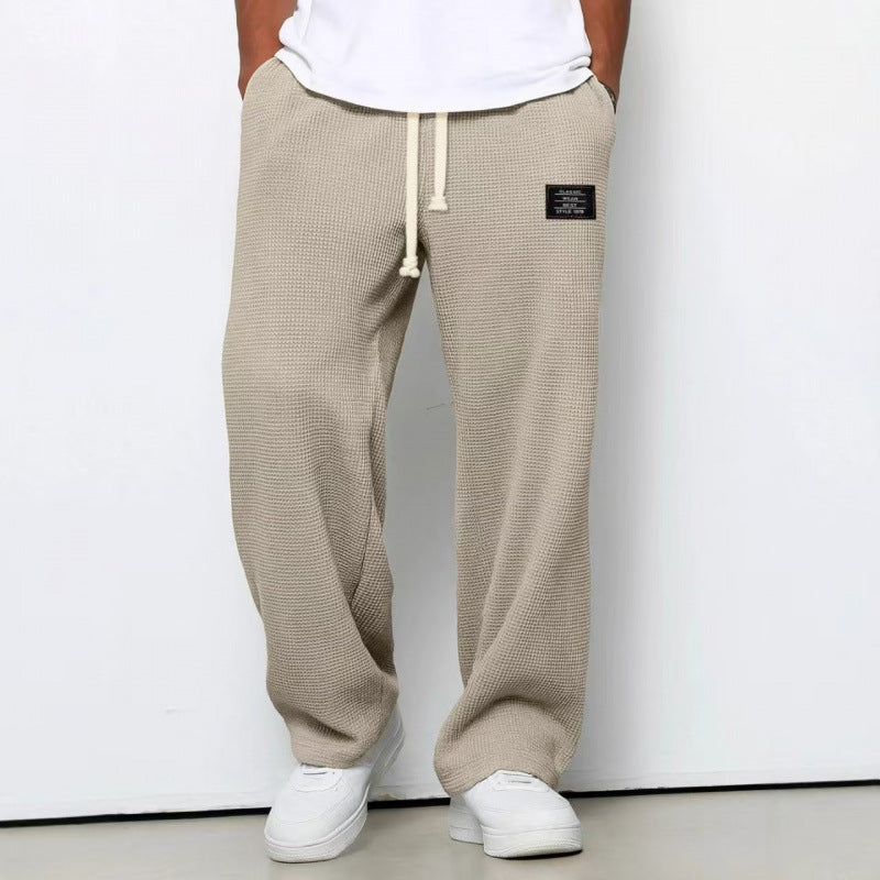 Pantalon décontracté à cordon de serrage en tissu gaufré pour homme