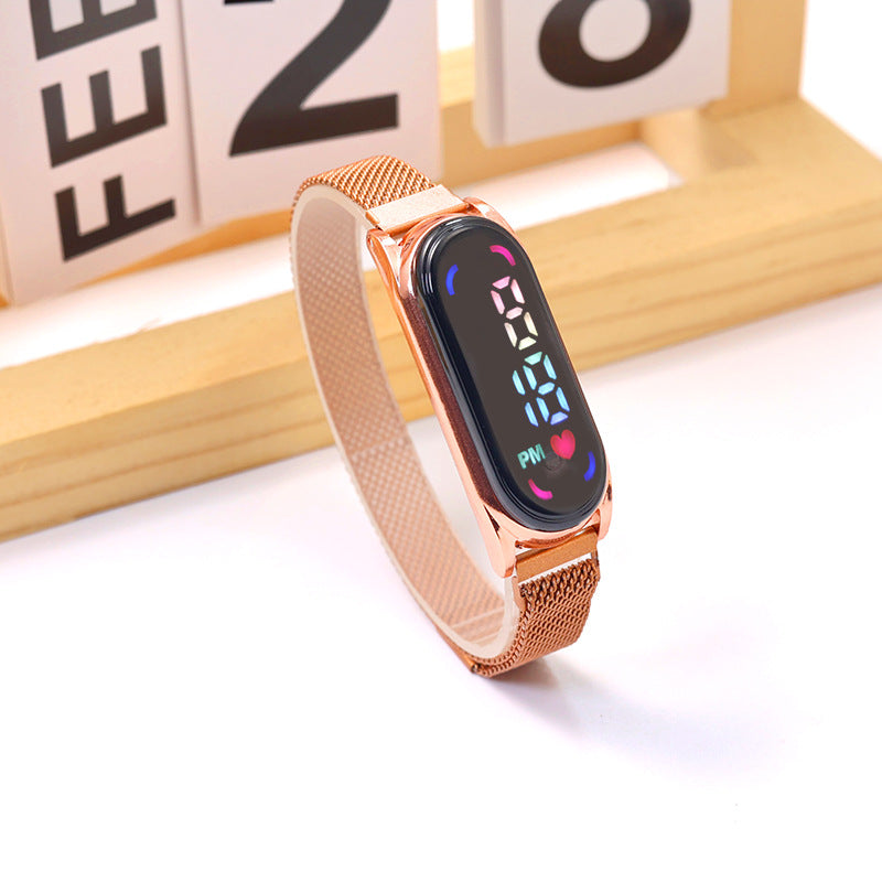 Montre électronique à LED avec lumières colorées et bracelet magnétique