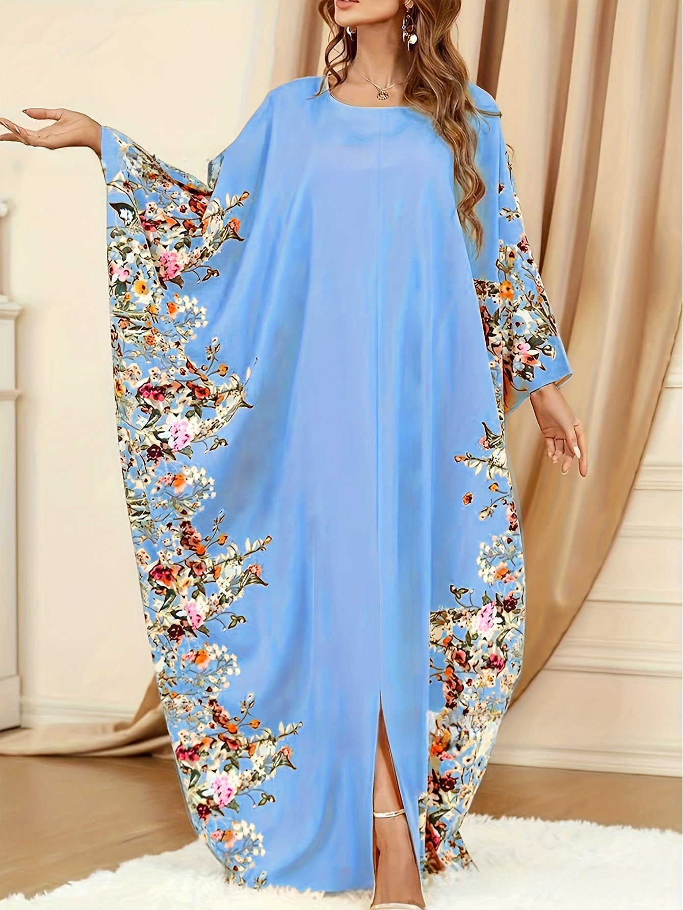 Robe longue élégante à manches chauve-souris